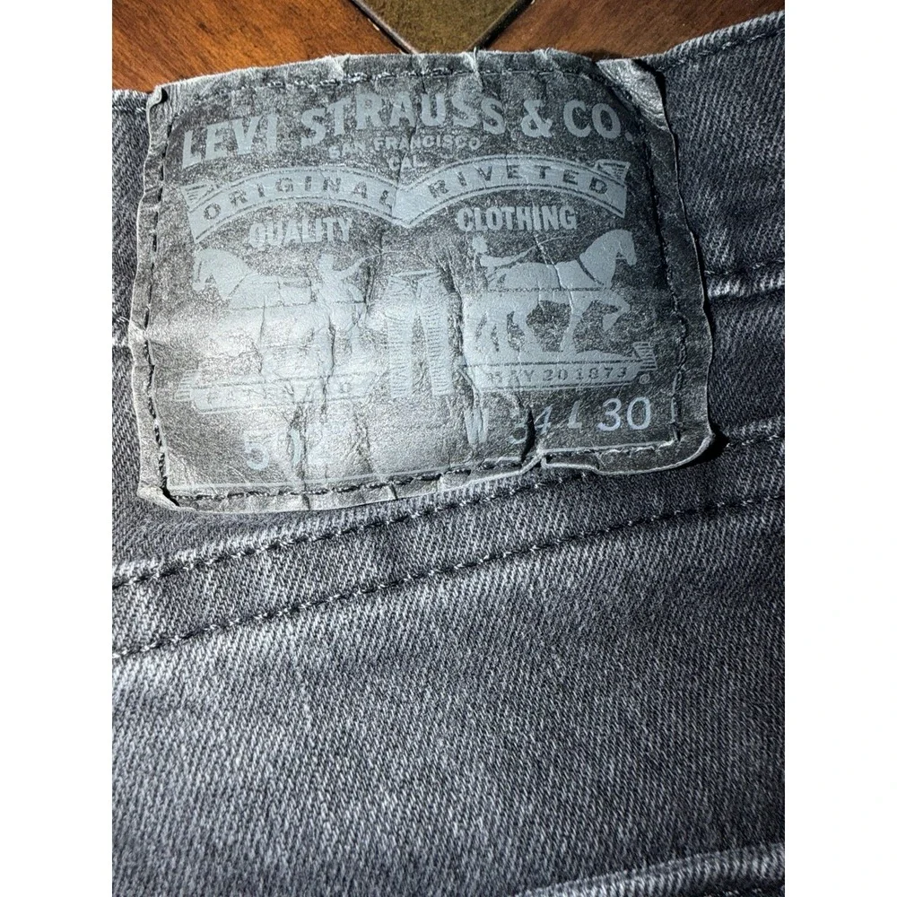 Levi's 502 Men's Tapered Leg Black Denim Jeans Size 34x28 Dark Wash C7